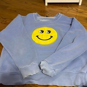 Blue and yellow smile sweater